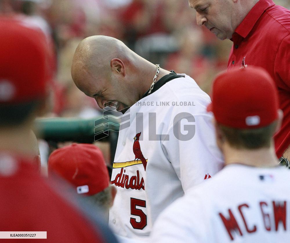Pujols hit by ball