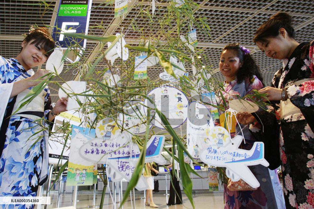 Passengers at Narita airport celebrate Star Festival
