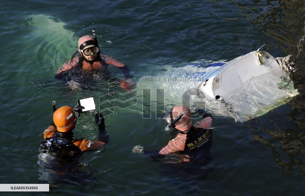 Search after coast guard copter crash
