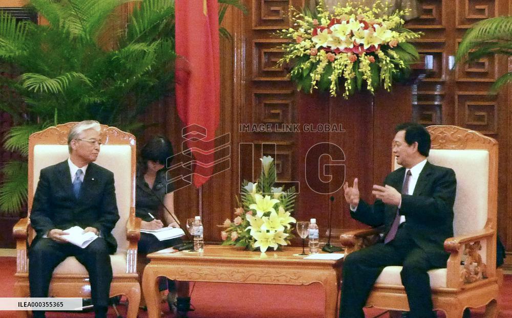 Economy minister Naoshima in Vietnam
