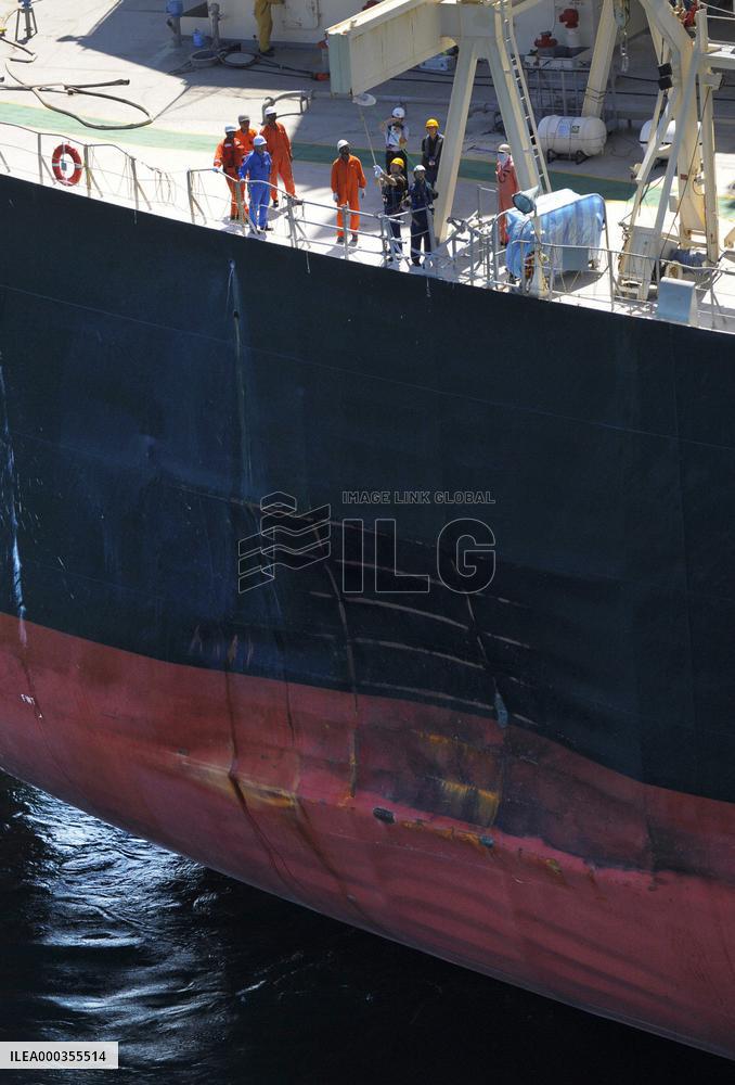 Damaged tanker examined