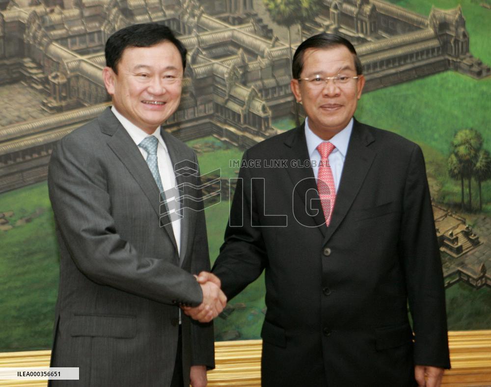 Fugitive ex-Thai premier holds talks with Cambodia's Hun Sen