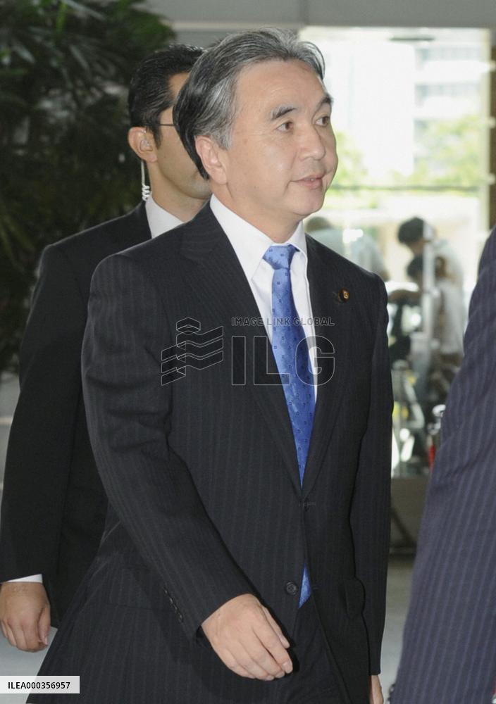 Reappointed reconstruction minister Hirano