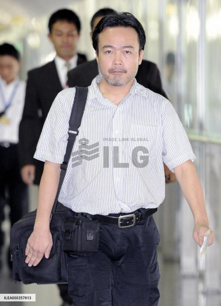 Freed journalist home