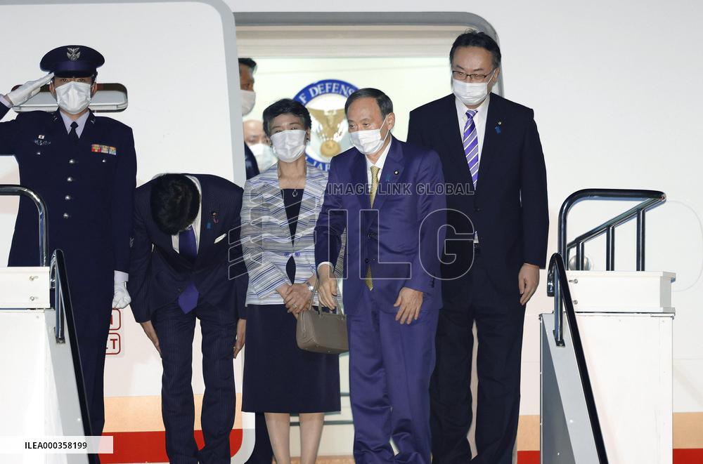 Japan PM Suga departs for G-7 summit in Britain