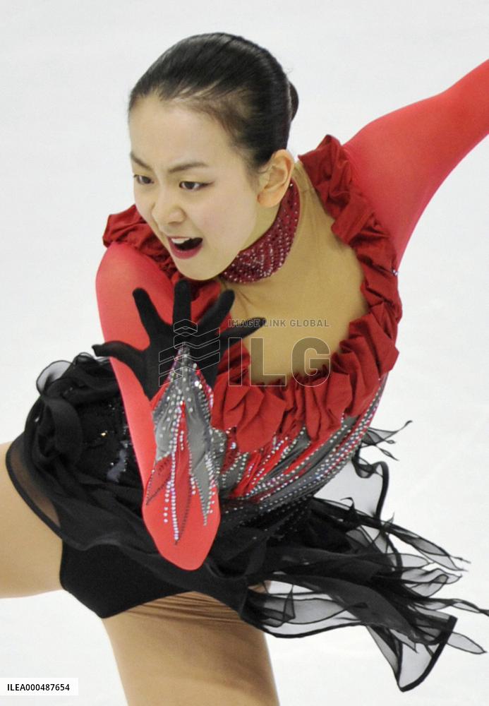Asada wins gold at world figure skating c'ships