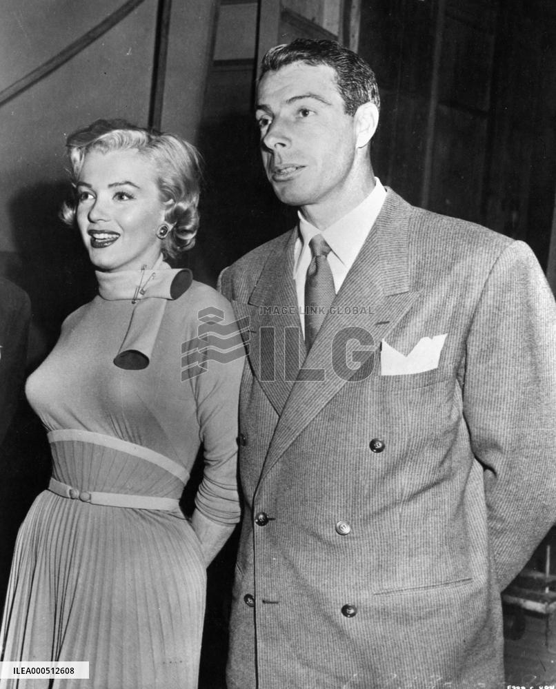 MARILYN MONROE with her second husband, Joe DiMaggio, 1954