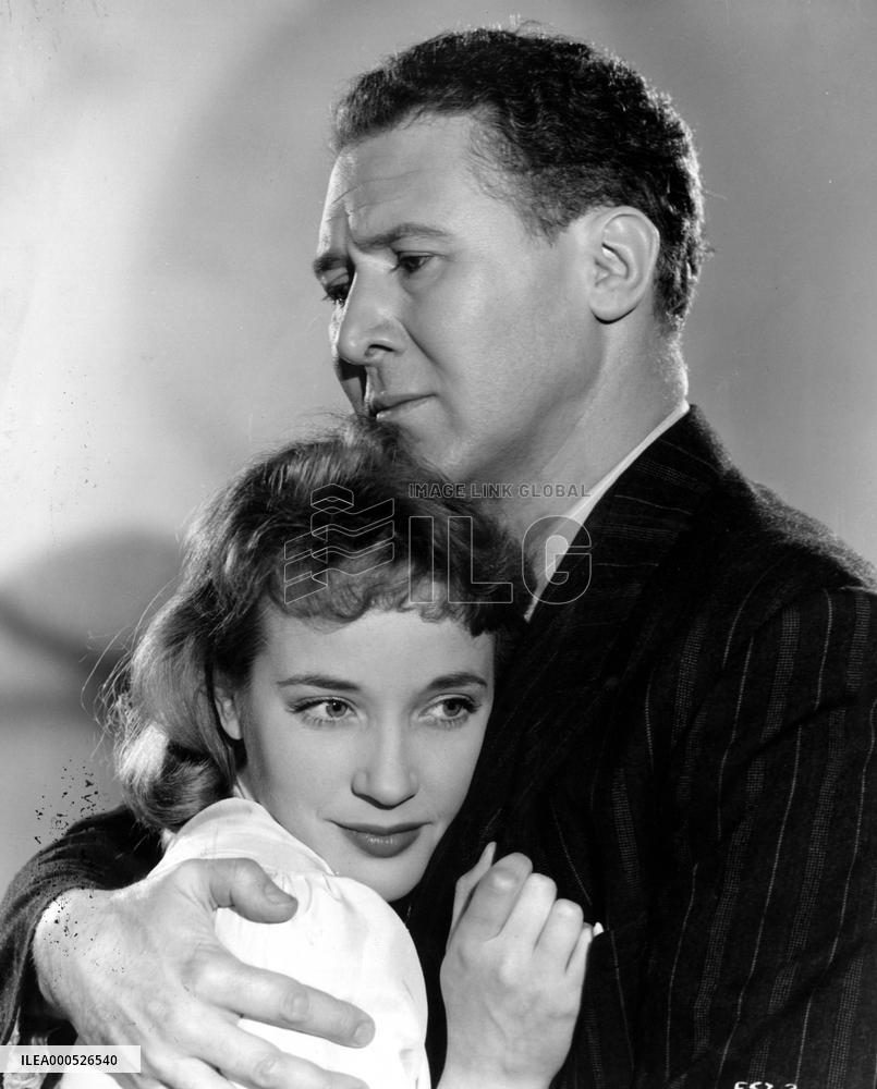 WOMAN IN A DRESSING GOWN