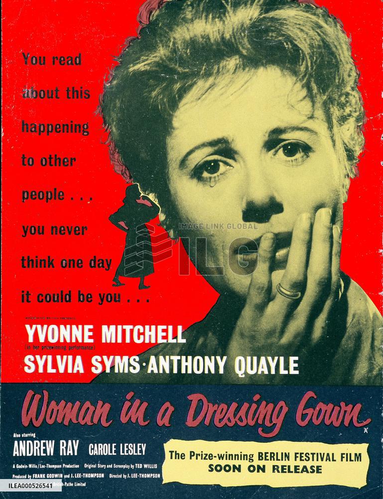 WOMAN IN A DRESSING GOWN