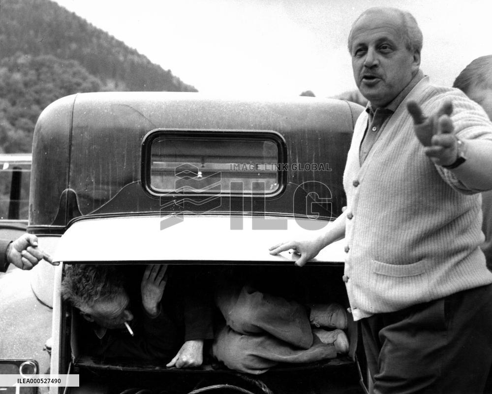 THE YELLOW ROLLS-ROYCE DIRECTOR, ANTHONY ASQUITH, IN THE TRU