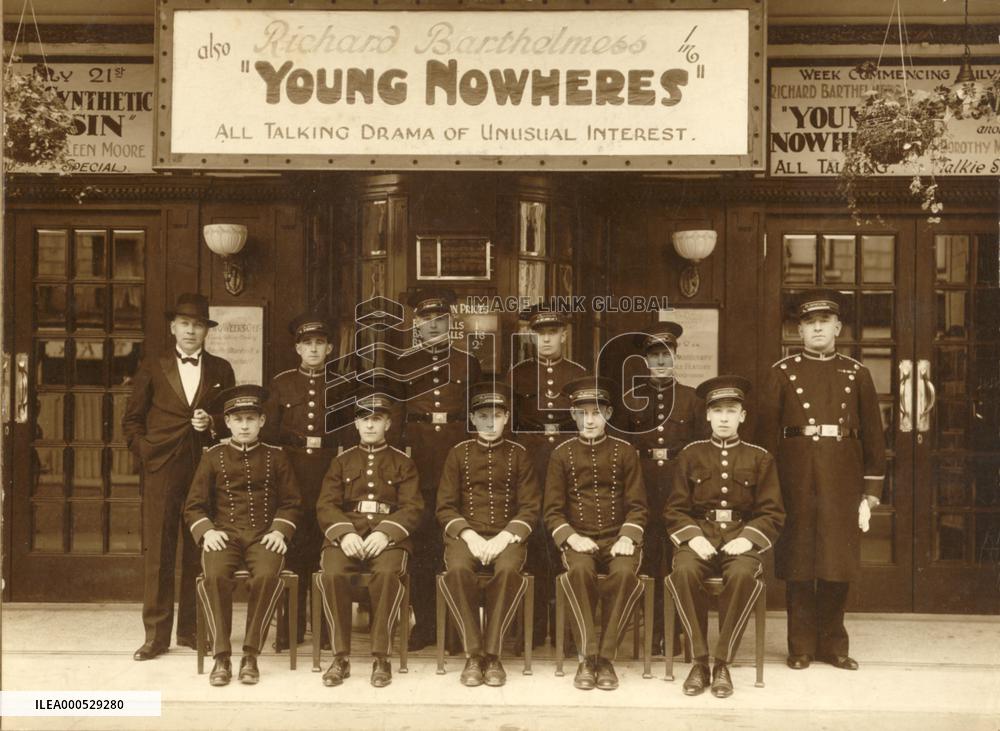 STAFF LINEUP IN FRONT OF THE PICTURE PLAYHOUSE  475-477 UNIO