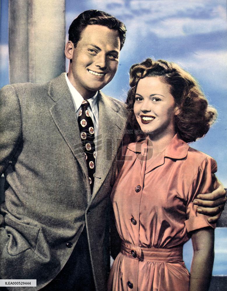 MARRIED COUPLE JOHN AGAR AND FORMER CHILD STAR SHIRLEY TEMPL