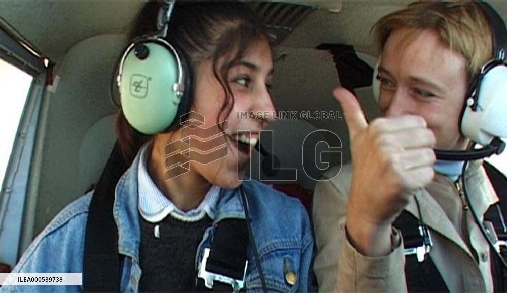 SMILING IN A WAR ZONE AND THE ART OF FLYING TO KABUL