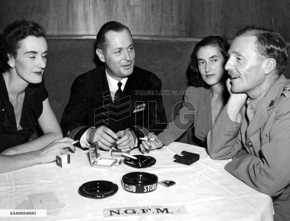 ROBERT MONTGOMERY AND FRIENDS AT THE STORK CLUB IN 1940