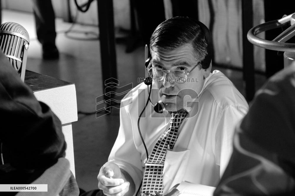 Fred Friendly (George Clooney) with headset. GOOD NIGHT, AND