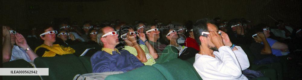 AN AUDIENCE WATCHING A 3 DIMENSION FILM IN LONDON'S NATIONAL