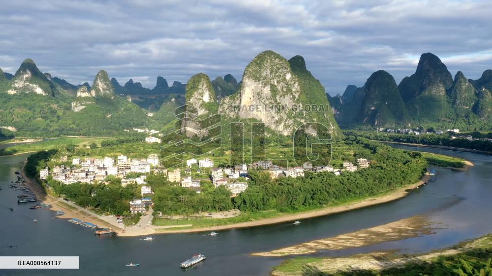 Drone Time-lapse Boats Sailing On The River In Yangshuo