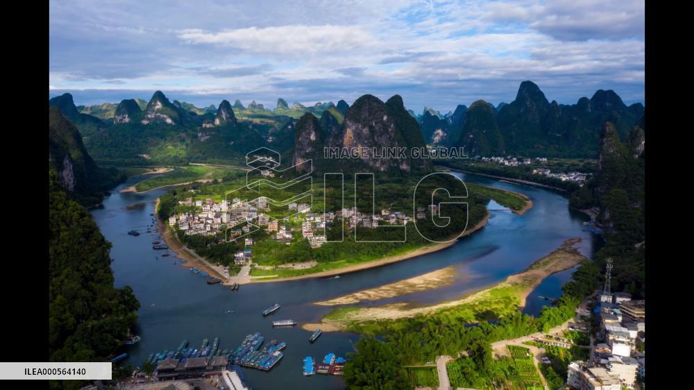 Drone Time-lapse Boats Sailing On The River In Yangshuo