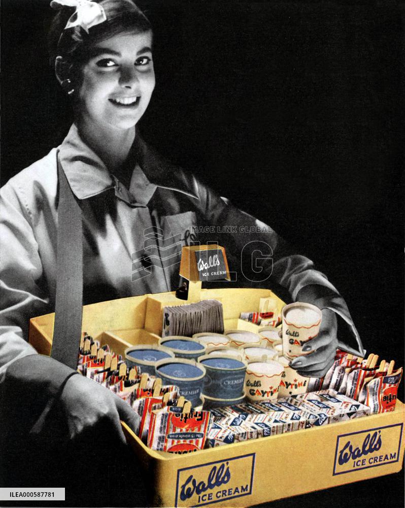 CINEMA SALES GIRL OFFERING WALL'S ICE CREAM