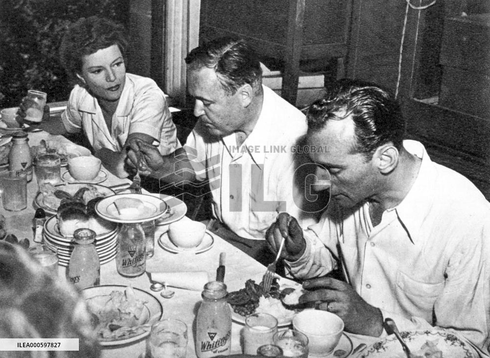 Film actress ANNABELLA, director HENRY HATHAWAY (centre), as