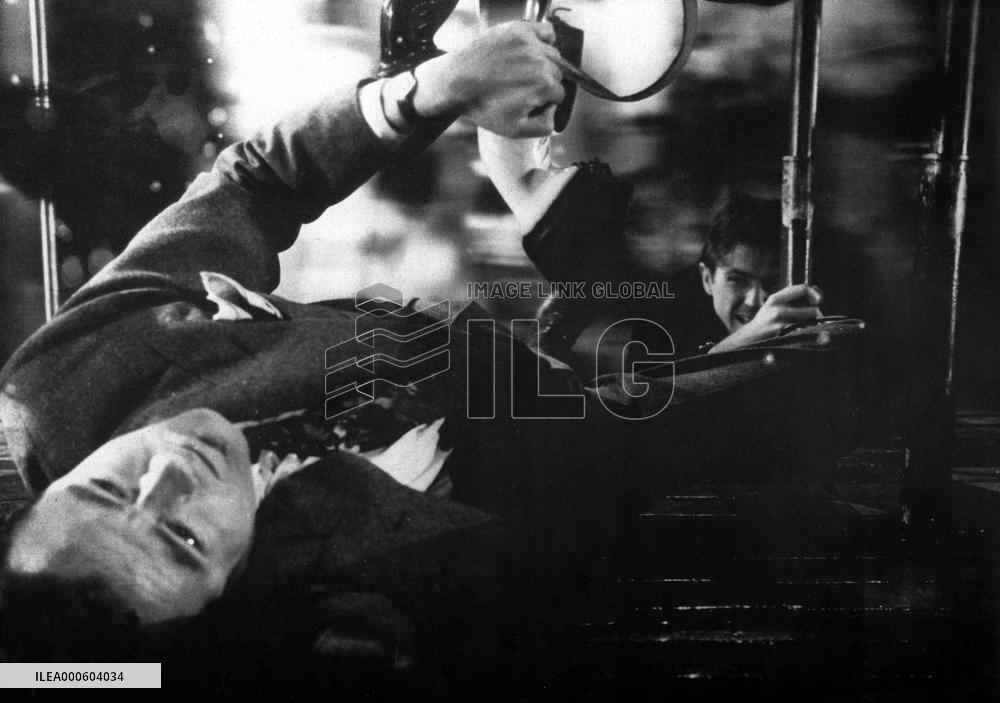 STRANGERS ON A TRAIN