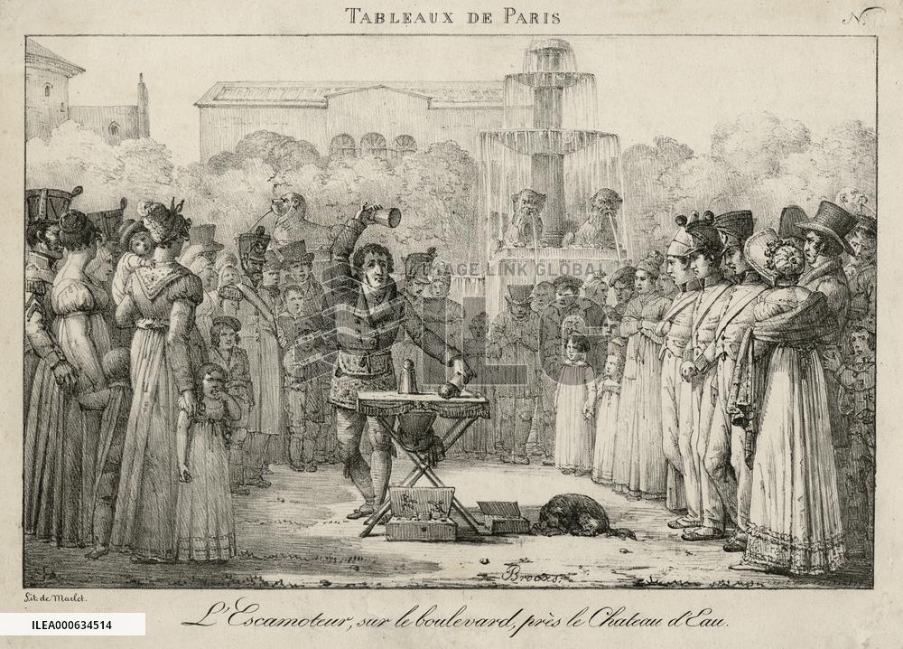 Magician performing the cup and balls trick