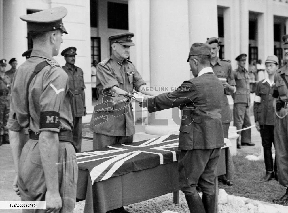 Formal surrender by Japanese Generak Itagahi of his sword
