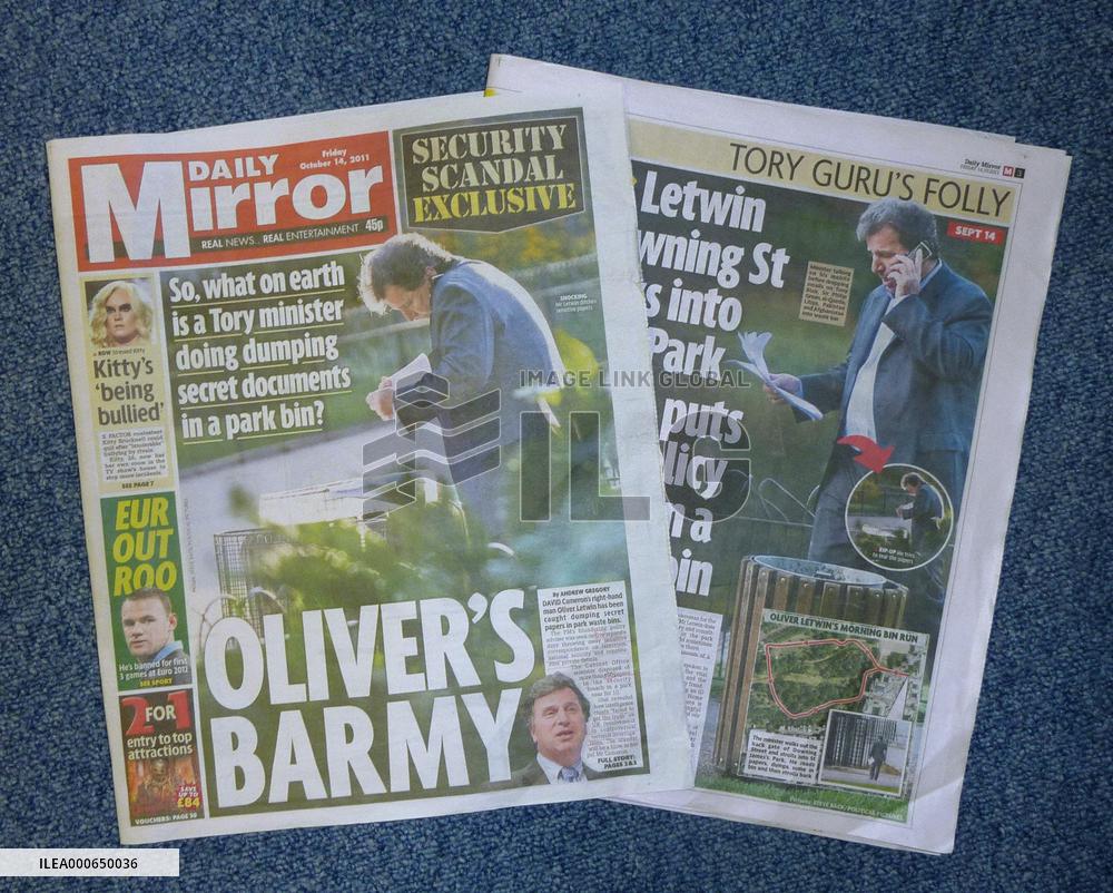 British minister pictured dumping official documents