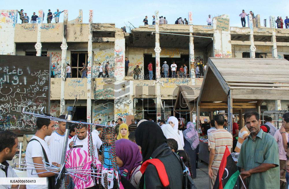 Tourists visit Gaddafi's former residence