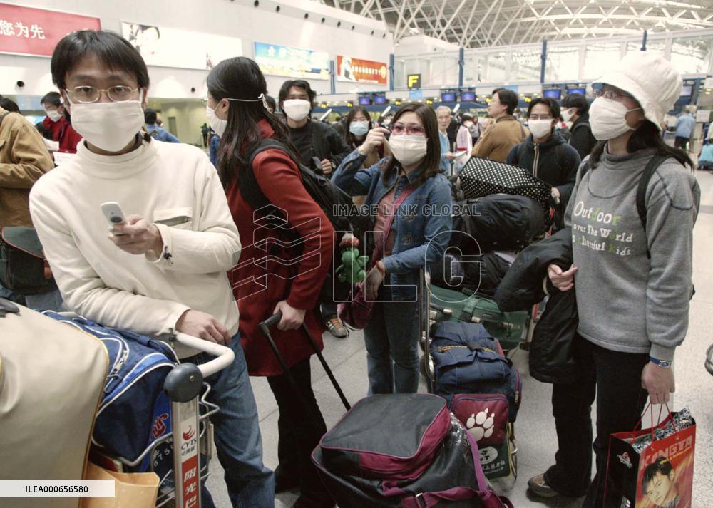 SARS infections top 2,000 in China, spread rapidly in Beijing