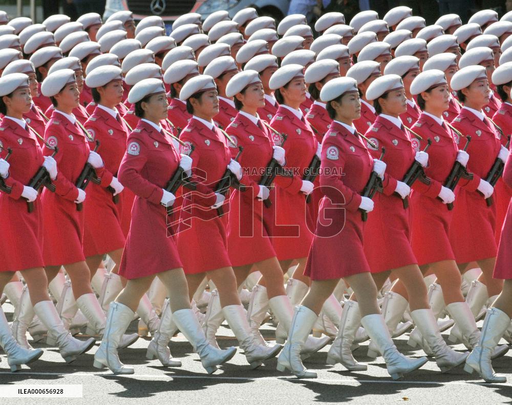 Beijing shows off new weaponry in 60th anniversary parade