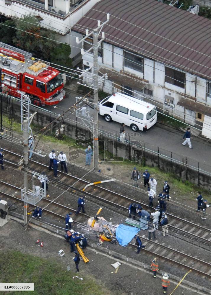 Copter crashes into railway tracks, 2 killed