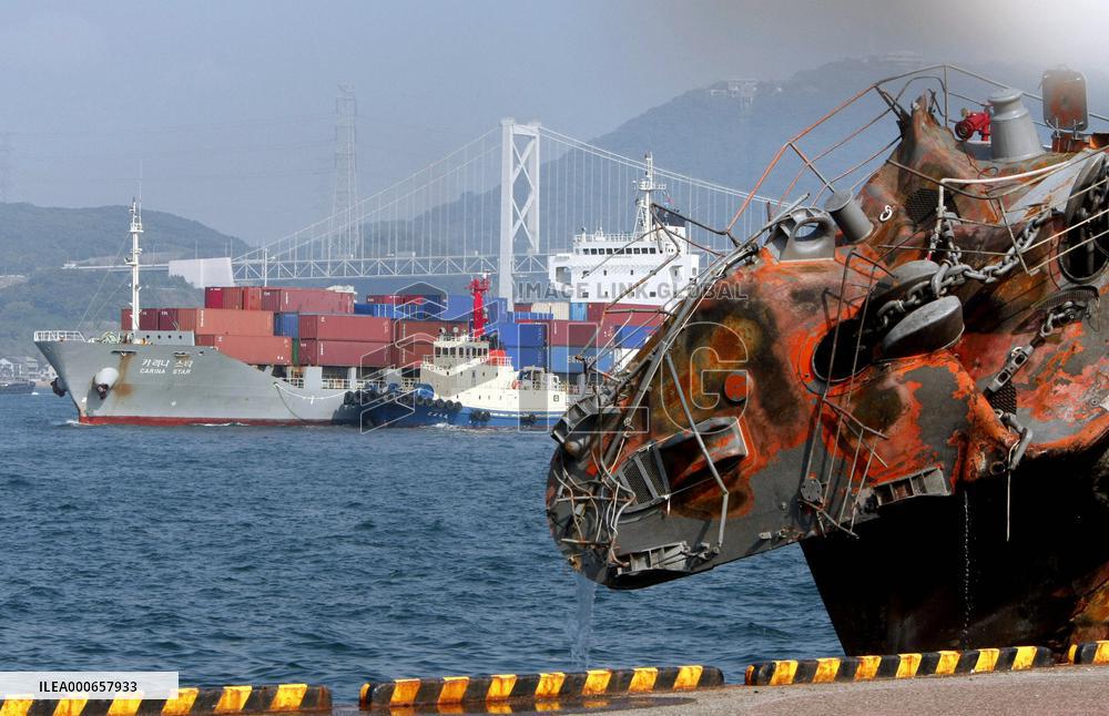 Damaged MSDF destroyer Kurama
