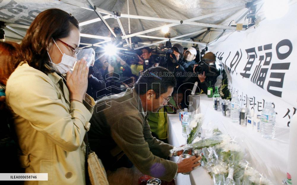 Officials say 7, not 8, Japanese died in Busan fire