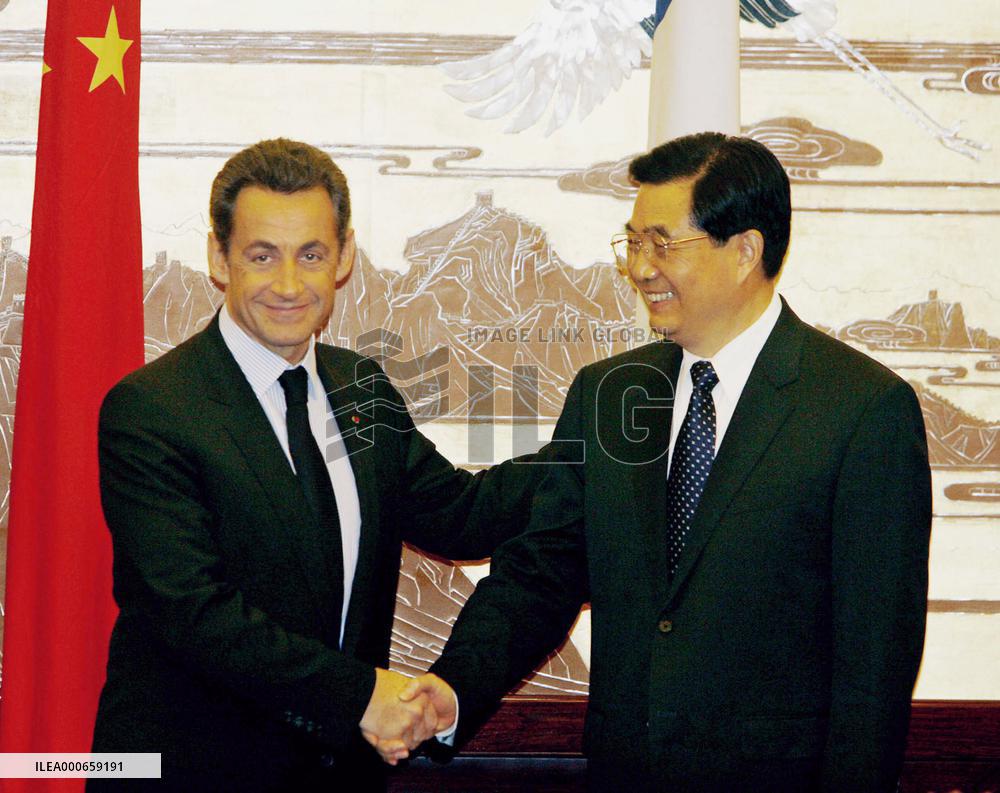 French president urges China to revalue currency
