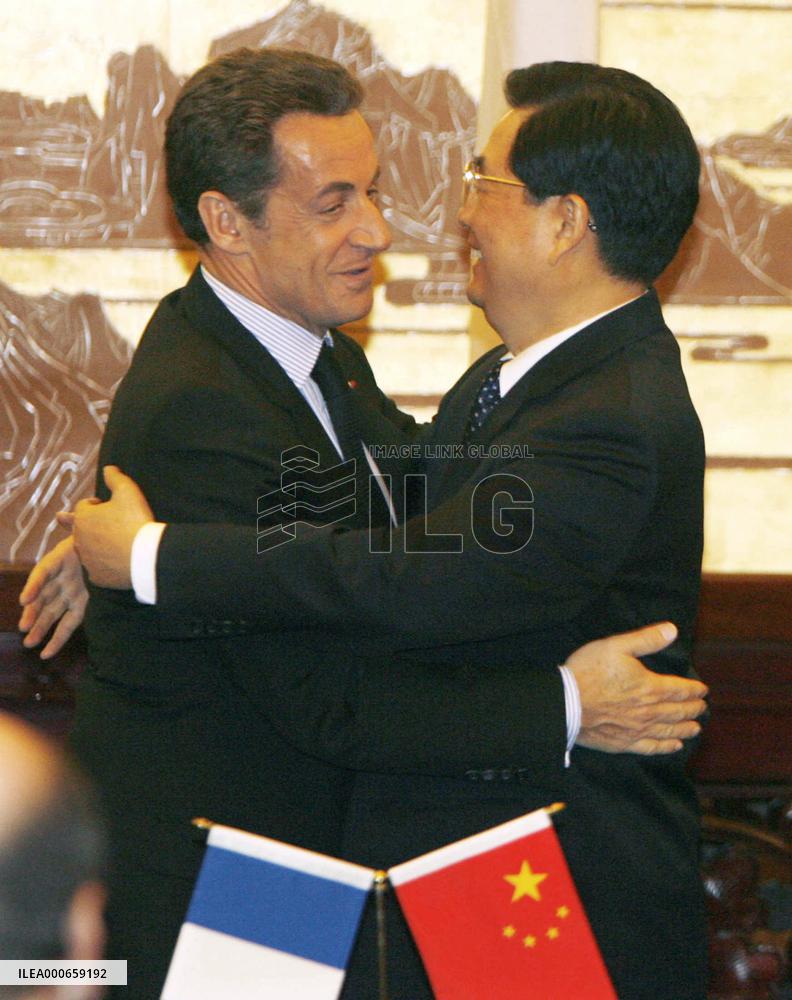 French president urges China to revalue currency