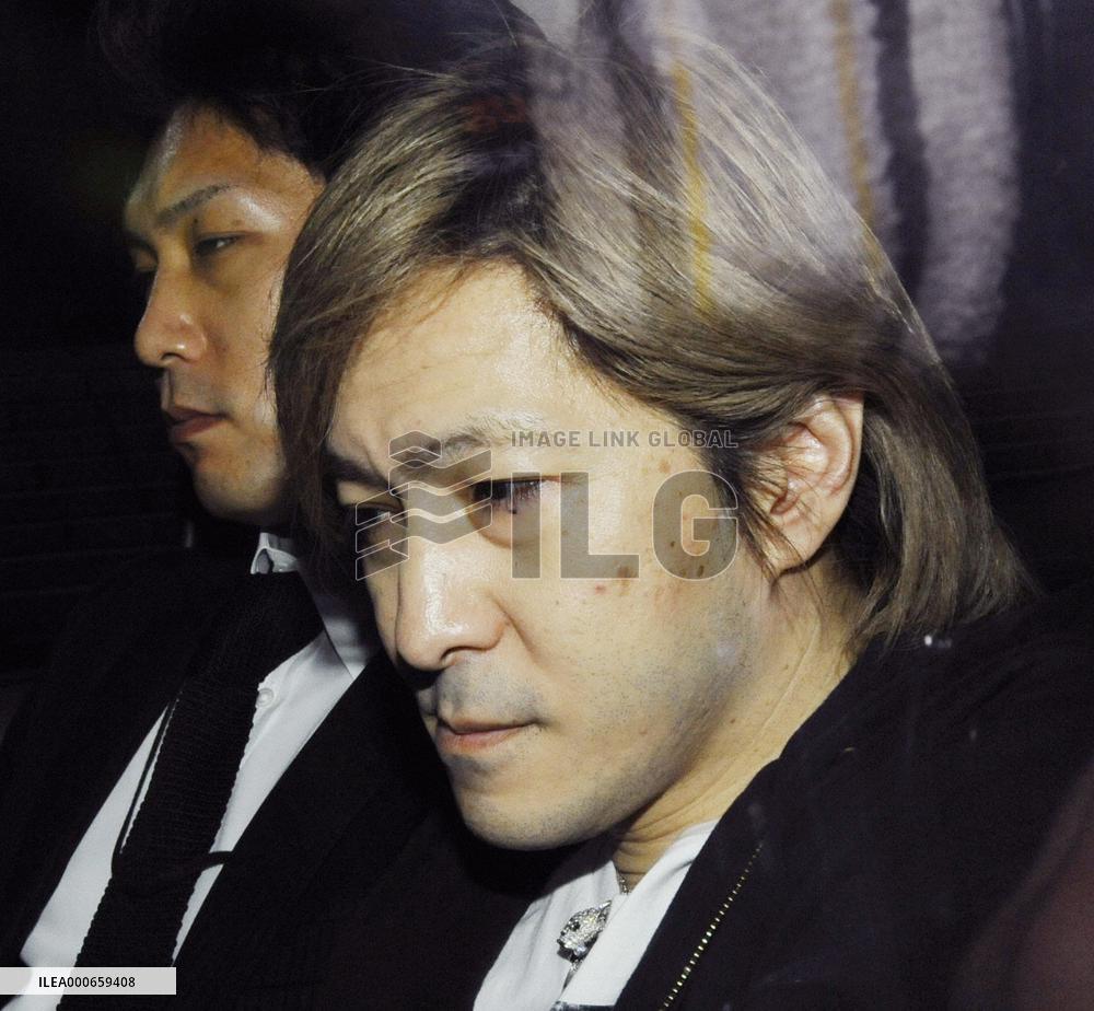 Music producer Komuro arrested for fraud