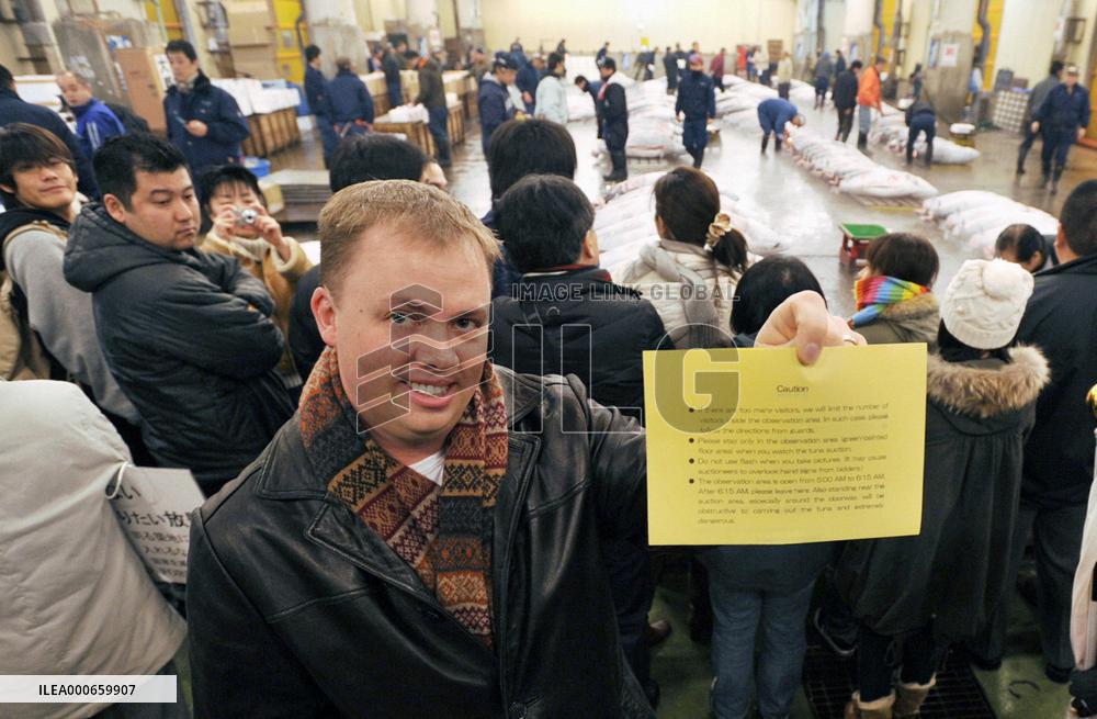 Tokyo's Tsukiji fish market readmits sightseers to tuna auctions