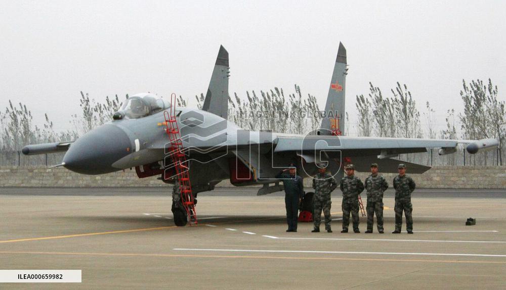 China unveils J-11 fighter