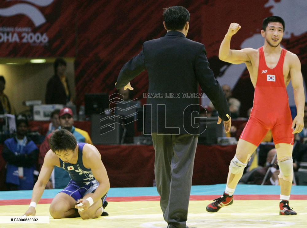 S. Korea's Baek wins gold in wrestling at Asian Games