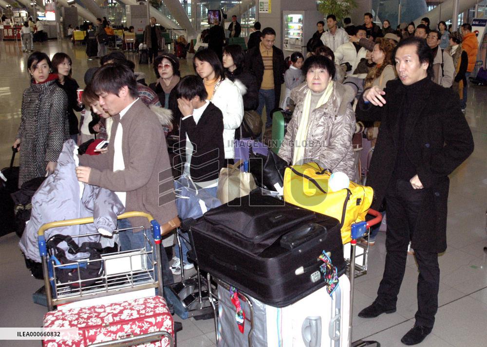 New Year holiday-makers pack Kansai airport