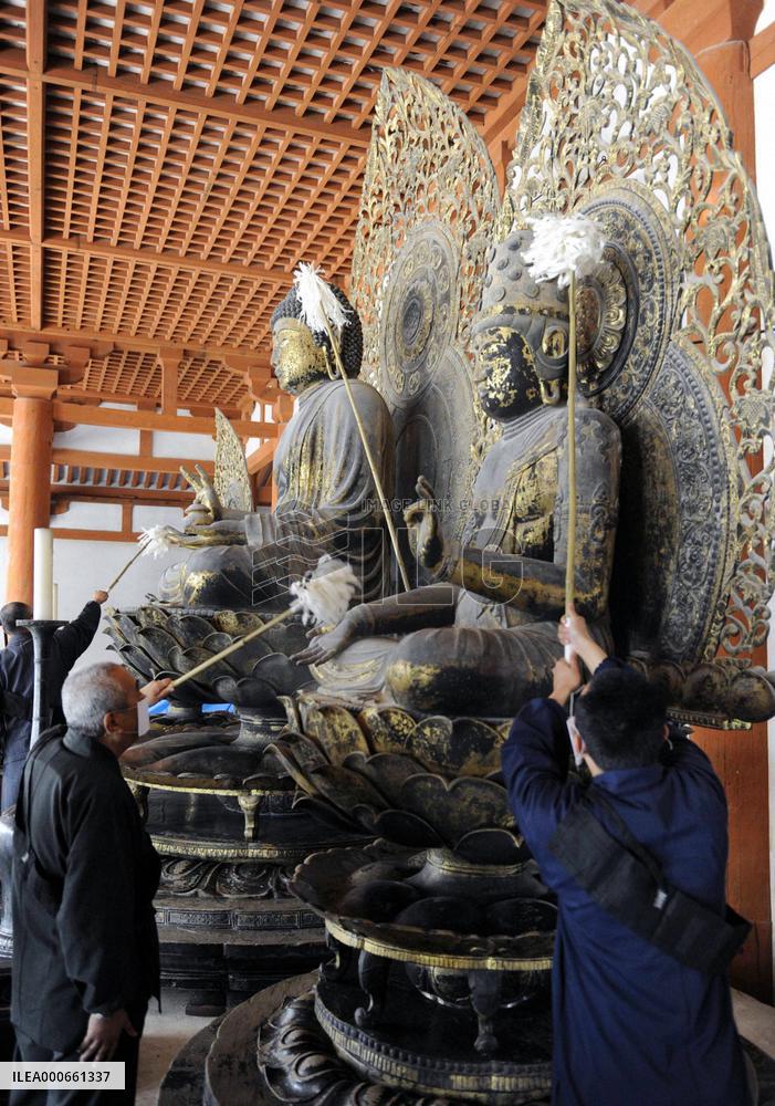 Buddha statues at Horyuji Temple cleaned in year-end event