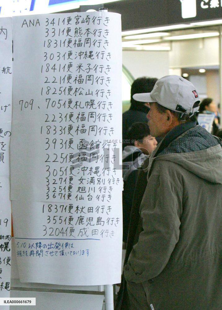 Stormy weather grounds flights, snow delays bullet trains