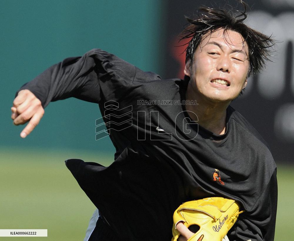 Baltimore's Uehara pitches during independent training