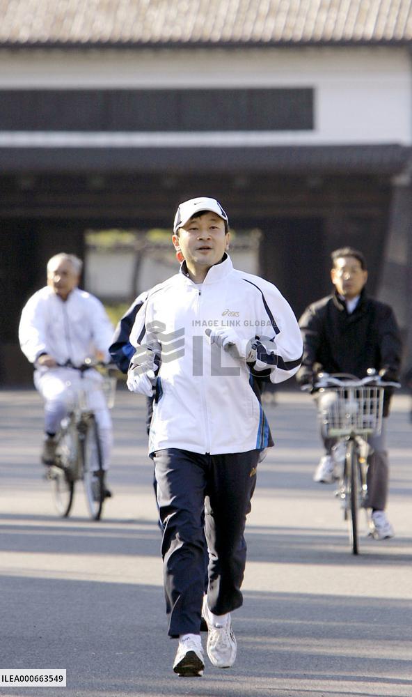 Crown Prince Naruhito jogs around the Imperial Palace