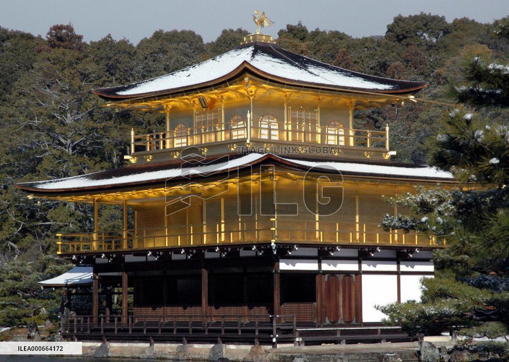 Kyoto's Kinkakuji covered with snow