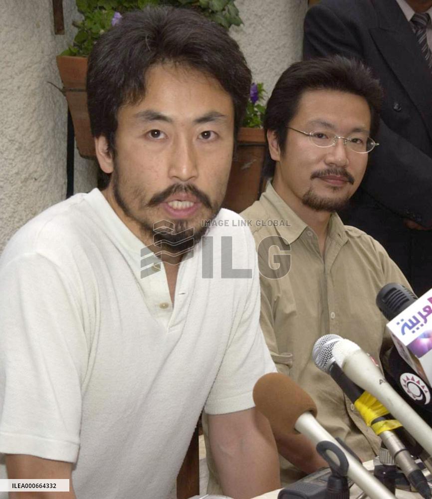2 freed Japanese apologize for causing trouble