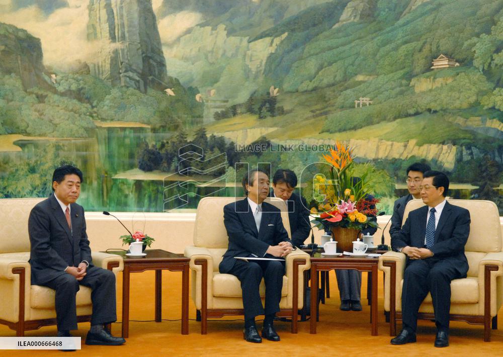 China's Hu calls Tibet riots plot to pressure China: lawmakers