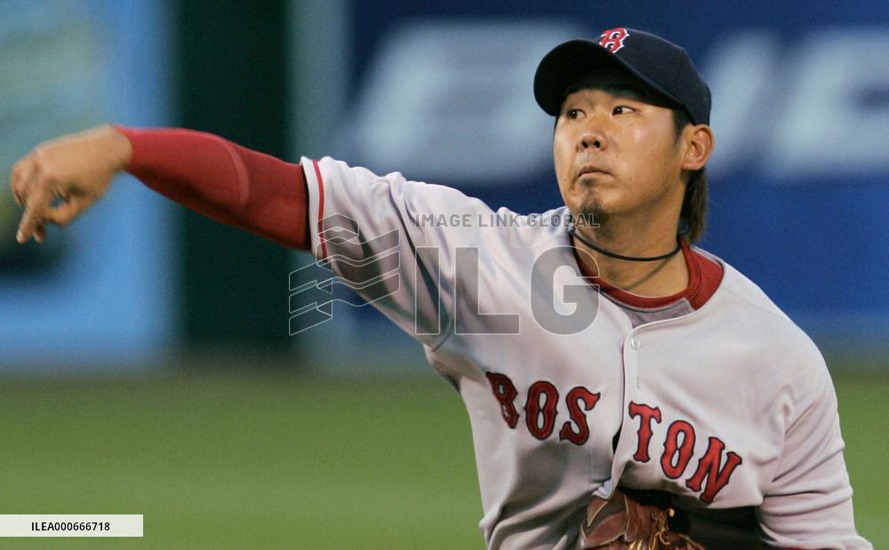 Red Sox Matsuzaka rolls over Athletics for 1st season win