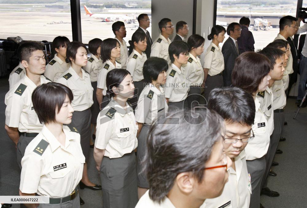 SDF personnel help with influenza checks at Narita airport